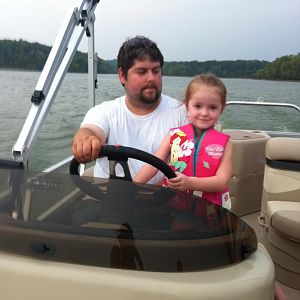 Hannah behind the wheel with Uncle Brett