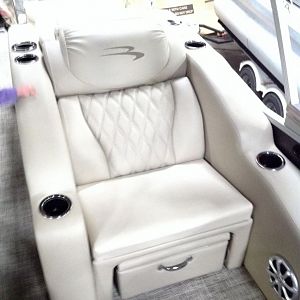 Co-captain lounge with pullout ottoman/cooler.
