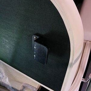 Factory L bracket located on outer (most starboard) edge of seat that holds that side down