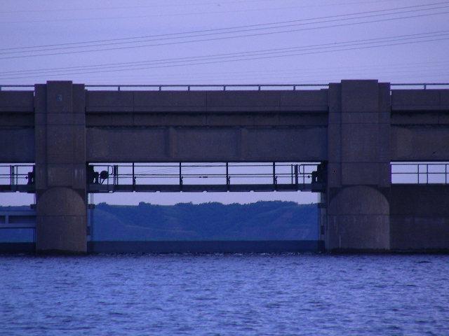 A view down the Missouri River valley looking through a Garrison dam spillway gate