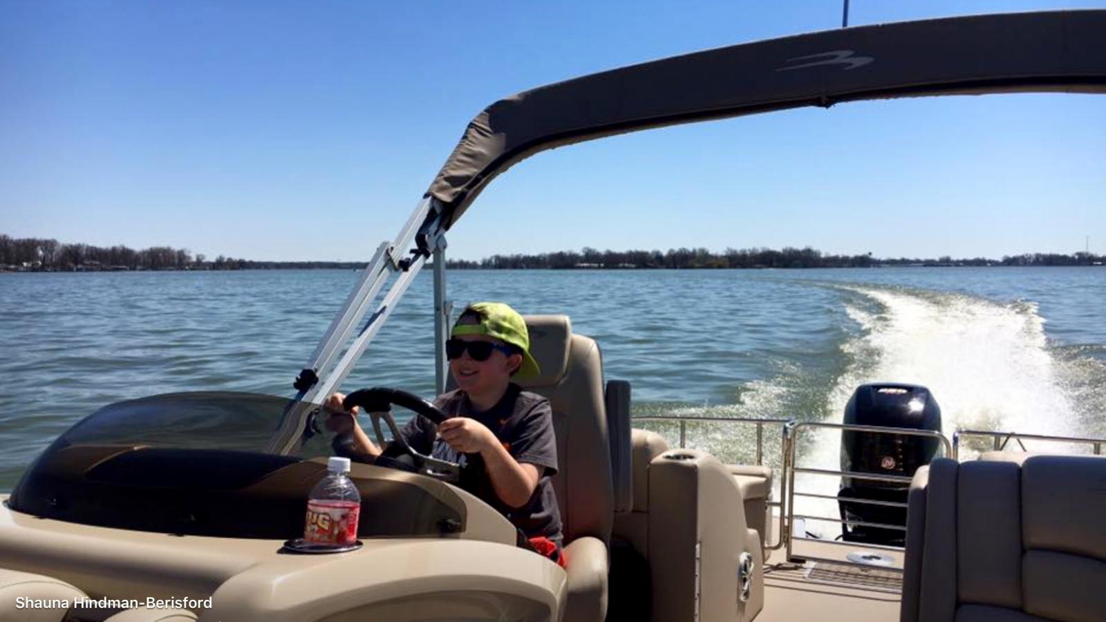 Blake driving on Indian Lake