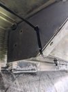 broken metal piece underneath with zip tie.jpg broken metal piece underneath with zip tie.jpg