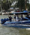 Waving to the crowd as we leave Caseville Harbor.jpg