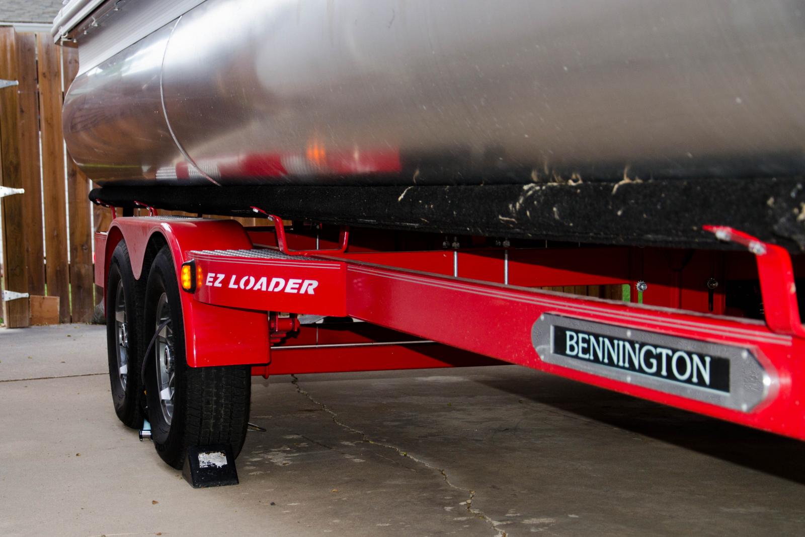 Bennington and EZ Loader illuminated logos