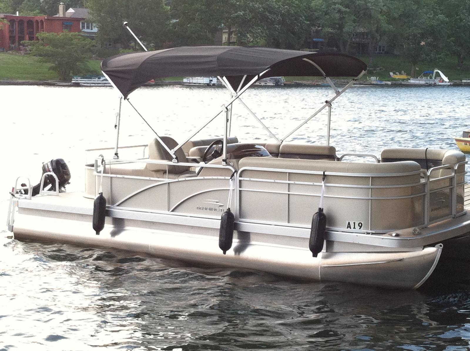 Black Bimini on a champagne boat