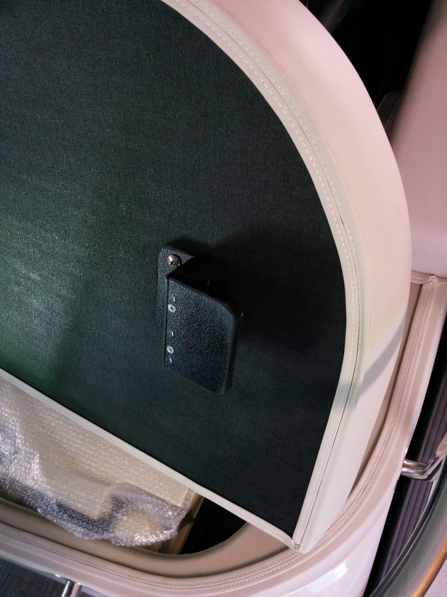 Factory L bracket located on outer (most starboard) edge of seat that holds that side down