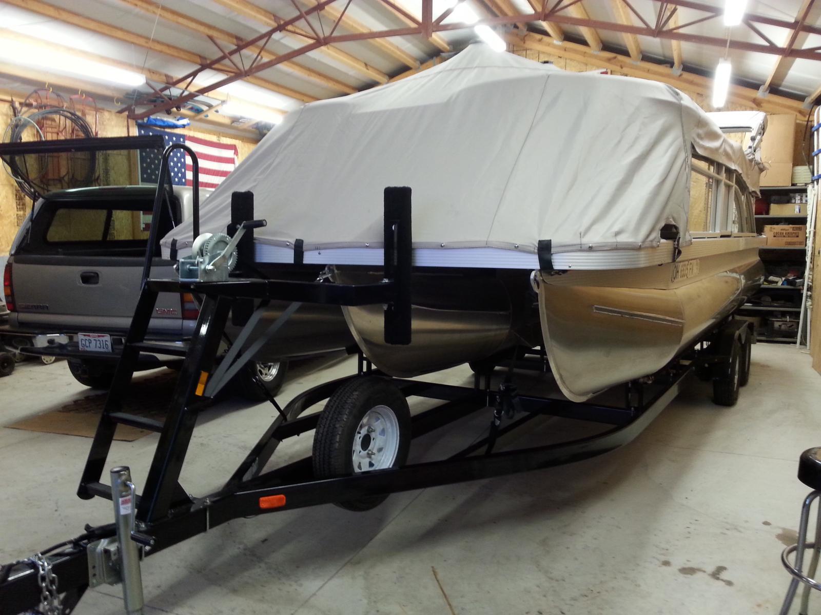 Straps added to mooring cover, spare tire.